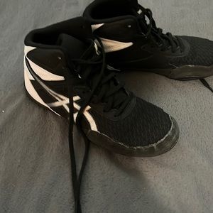 Black and white wrestling shoes